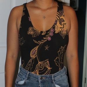 pattern body suit orange pink and brown with strap